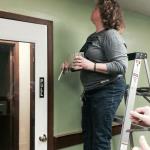 OSPS Assistant Director, Julie Starrett, painting at the new retail space for Bath Works by Bobbi.