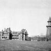 Old photo of water tower and hospital building at Massillon State Hospital
